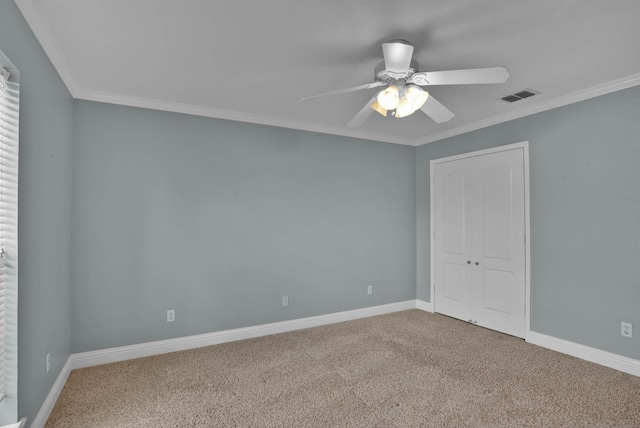 245 Harders Crossing Blvd, Shreveport, LA 71106 - unfurnished bedroom featuring carpet floors, crown molding, a closet, and a ceiling fan