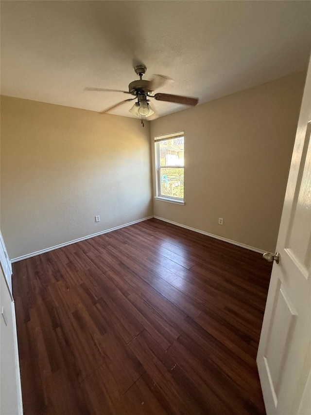 900 Reese Ln, Azle, TX 76020 - spare room with ceiling fan and dark wood-style flooring