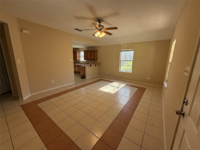900 Reese Ln, Azle, TX 76020 - unfurnished living room with light tile patterned floors and ceiling fan