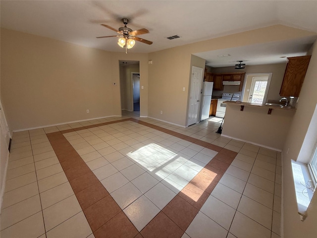 900 Reese Ln, Azle, TX 76020 - unfurnished room with light tile patterned flooring and a ceiling fan