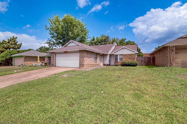 2411 Brookdale Dr, Arlington, TX 76014 - single story home featuring brick siding, a garage, and driveway