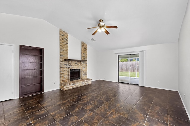 2411 Brookdale Dr, Arlington, TX 76014 - unfurnished living room with ceiling fan, lofted ceiling, a brick fireplace, tile patterned floors, and built in features