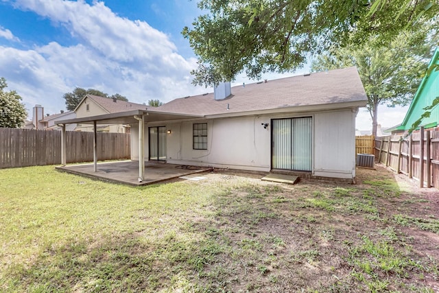 2411 Brookdale Dr, Arlington, TX 76014 - rear view of house with a patio area and a fenced backyard