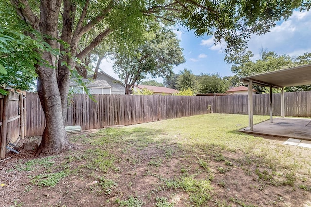 2411 Brookdale Dr, Arlington, TX 76014 - fenced backyard with a patio area