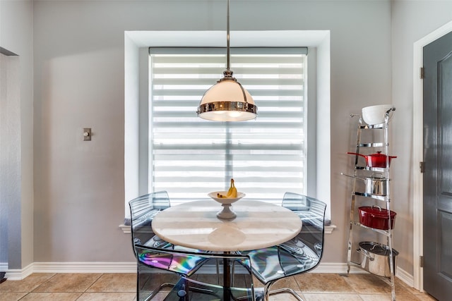 2521 Glen Morris Rd, Carrollton, TX 75007 - dining area featuring healthy amount of natural light and light tile patterned floors