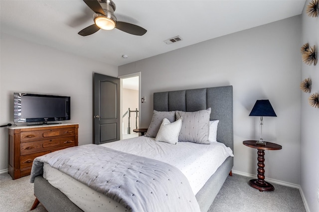 2521 Glen Morris Rd, Carrollton, TX 75007 - bedroom with light carpet and ceiling fan
