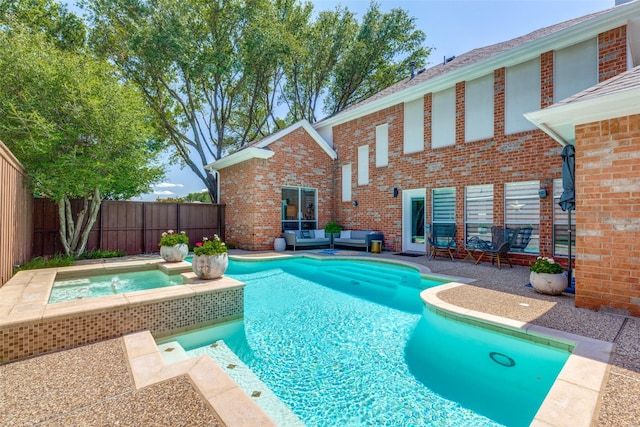 2521 Glen Morris Rd, Carrollton, TX 75007 - view of pool with outdoor lounge area, a fenced backyard, a patio area, and a pool with connected hot tub