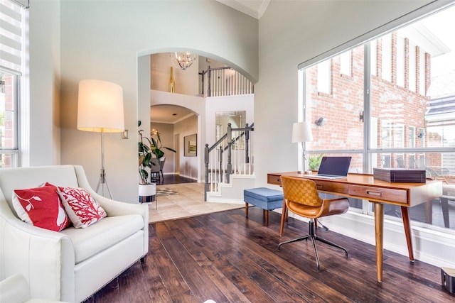 2521 Glen Morris Rd, Carrollton, TX 75007 - office space with arched walkways, wood-type flooring, ornamental molding, a chandelier, and a high ceiling