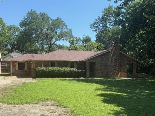 8761 S County Rd, Frisco, TX 75034 - ranch-style house featuring a front yard and a chimney