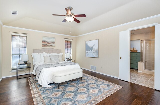 6515 Genstar Ln, Dallas, TX 75252 - bedroom with dark wood-style floors, a tray ceiling, crown molding, ensuite bathroom, and ceiling fan