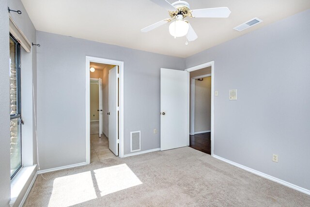 6515 Genstar Ln, Dallas, TX 75252 - unfurnished bedroom with carpet flooring and ceiling fan