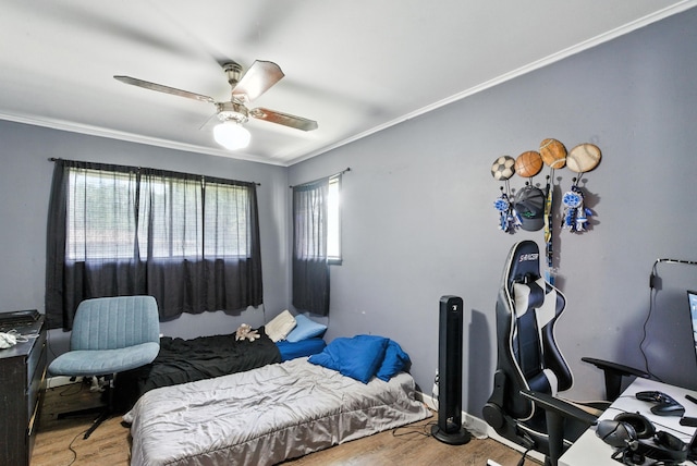 1442 W Water St, Weatherford, TX 76086 - bedroom with wood finished floors, ornamental molding, and a ceiling fan