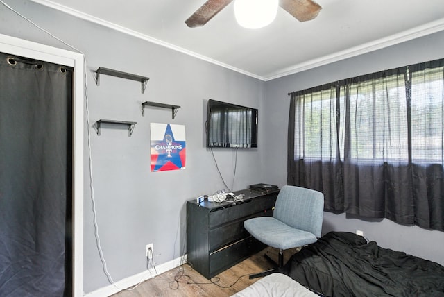 1442 W Water St, Weatherford, TX 76086 - bedroom with crown molding, wood finished floors, and ceiling fan