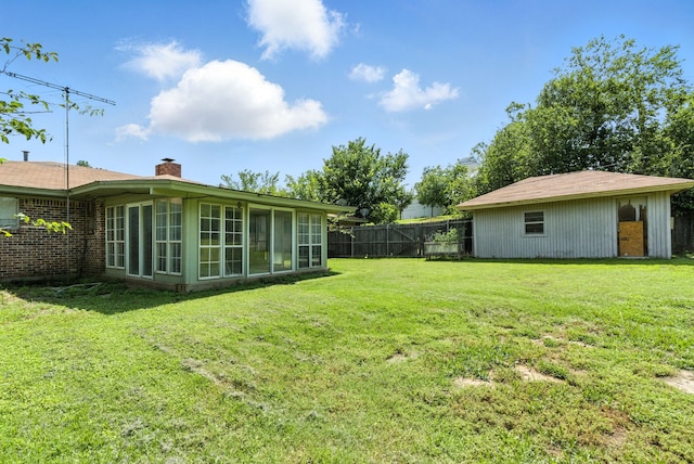 1442 W Water St, Weatherford, TX 76086 - view of yard with a sunroom