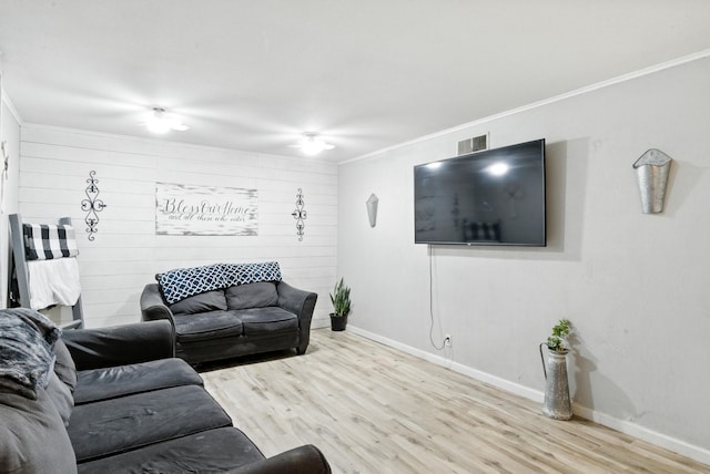 1442 W Water St, Weatherford, TX 76086 - living area with wood finished floors and ornamental molding