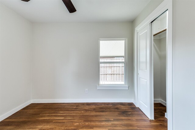 1528 Ridgeview St, Mesquite, TX 75149 - unfurnished bedroom featuring dark wood-type flooring, a closet, and a ceiling fan