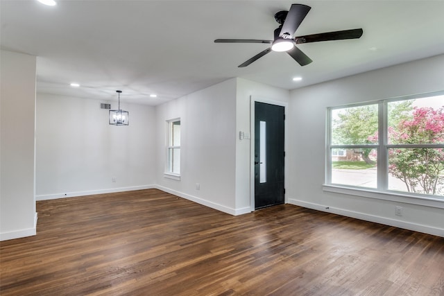 1528 Ridgeview St, Mesquite, TX 75149 - spare room featuring a chandelier, healthy amount of natural light, dark wood-style flooring, recessed lighting, and a ceiling fan
