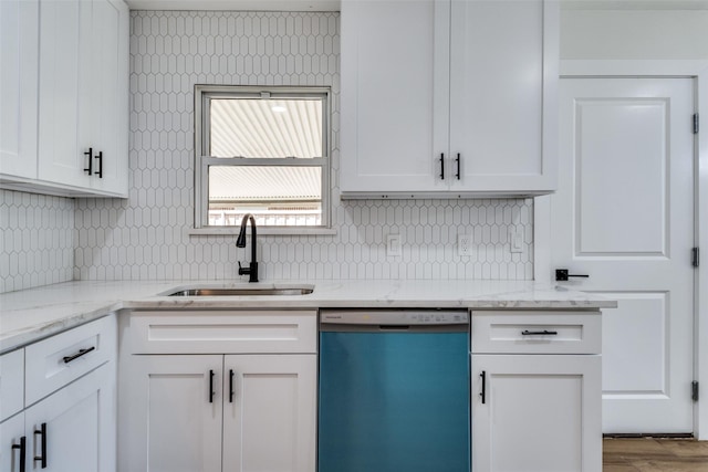 1528 Ridgeview St, Mesquite, TX 75149 - kitchen featuring dishwashing machine, tasteful backsplash, white cabinetry, and light stone countertops