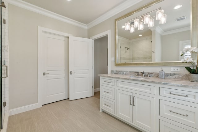1806 Scenic Cir, Westlake, TX 76262 - bathroom featuring a stall shower, vanity, ornamental molding, wood finished floors, and recessed lighting