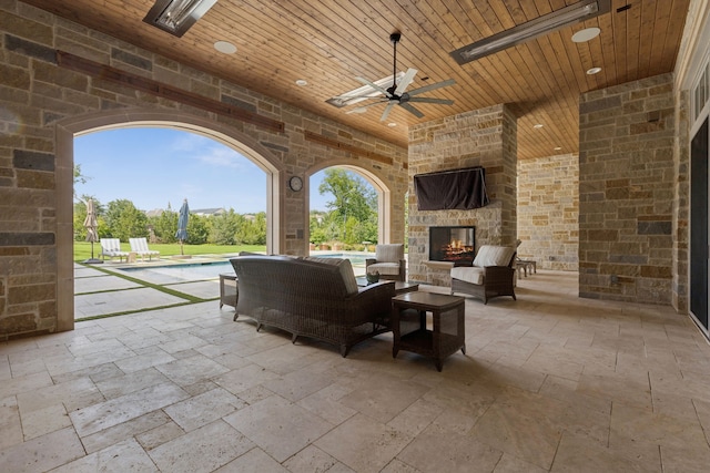 1806 Scenic Cir, Westlake, TX 76262 - view of patio with a ceiling fan, an outdoor living space with a fireplace, and an outdoor pool