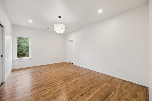 3106 W Jefferson Blvd, Dallas, TX 75211 - empty room with light wood-style floors and recessed lighting