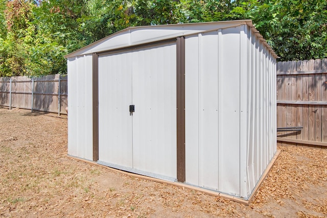 319 W Johnson St, Denison, TX 75020 - view of shed with a fenced backyard