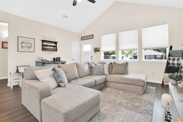319 W Johnson St, Denison, TX 75020 - living room with ceiling fan, dark wood-style flooring, and high vaulted ceiling