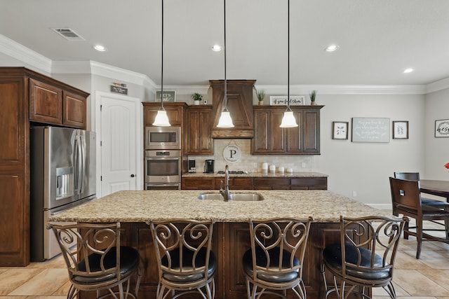 6902 Golf Green Dr, Arlington, TX 76001 - kitchen featuring stainless steel appliances, ornamental molding, decorative backsplash, custom exhaust hood, and light stone counters