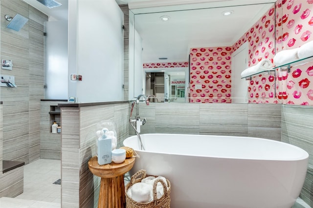 3449 Potomac Ave, Highland Park, TX 75205 - bathroom with tile walls, a freestanding tub, tile patterned floors, crown molding, and tiled shower
