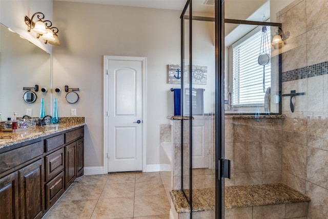 17055 Lochwood Ln, Forney, TX 75126 - bathroom with double vanity, a stall shower, tile patterned floors, and a garden tub
