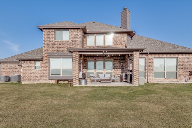17055 Lochwood Ln, Forney, TX 75126 - back of property featuring brick siding and a shingled roof