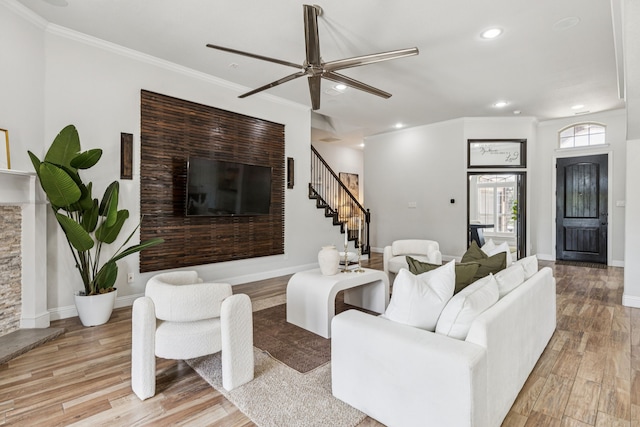 4225 Rustic Timbers Dr, Fort Worth, TX 76244 - living room with recessed lighting, a ceiling fan, light wood finished floors, ornamental molding, and stairway