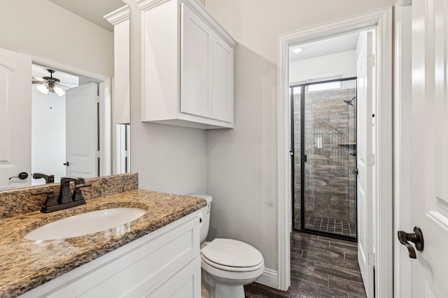 4225 Rustic Timbers Dr, Fort Worth, TX 76244 - bathroom with a stall shower, vanity, wood finished floors, and a ceiling fan