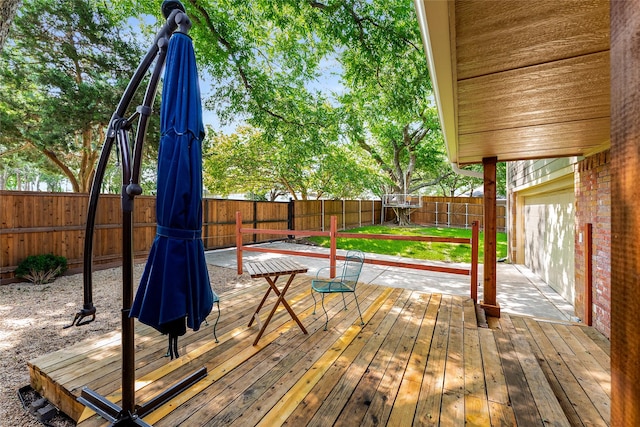 2704 Sunset Ave, Dallas, TX 75211 - wooden terrace with a fenced backyard