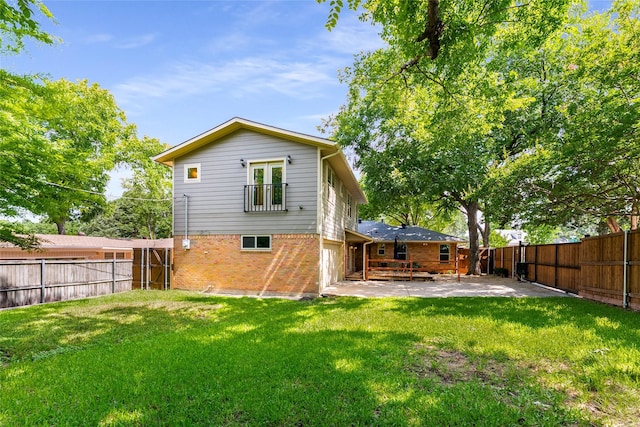 2704 Sunset Ave, Dallas, TX 75211 - back of house with a patio area, a fenced backyard, and brick siding