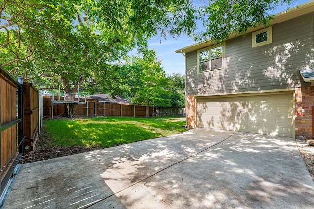 2704 Sunset Ave, Dallas, TX 75211 - fenced backyard with a garage and driveway