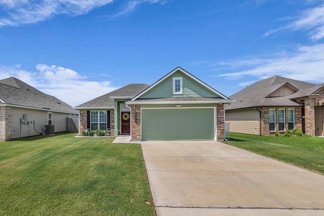 917 N Fork Ranch Rd, Waco, TX 76705 - craftsman house featuring a front lawn, a garage, concrete driveway, and brick siding
