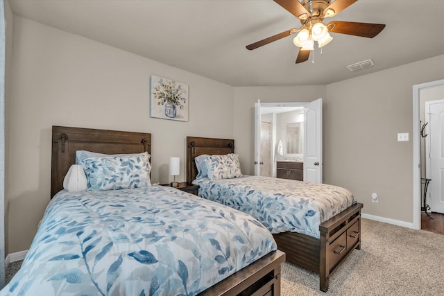 917 N Fork Ranch Rd, Waco, TX 76705 - bedroom featuring light colored carpet, ceiling fan, and ensuite bathroom