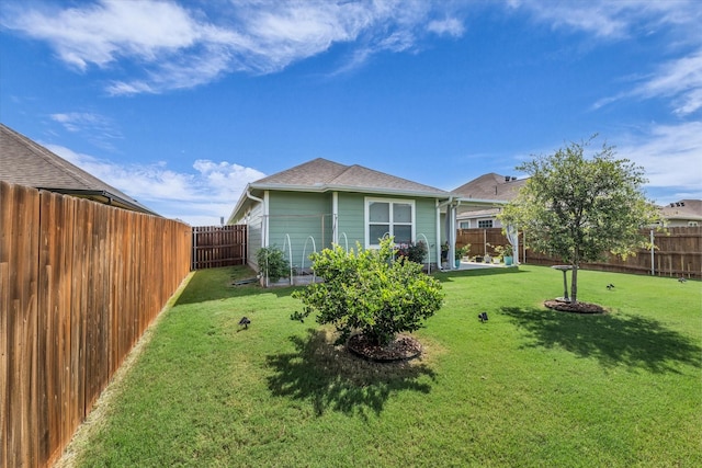 917 N Fork Ranch Rd, Waco, TX 76705 - rear view of house featuring a fenced backyard and roof with shingles