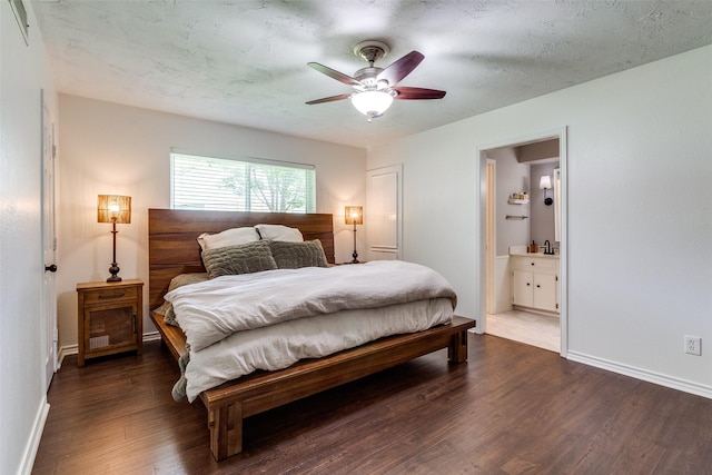 12030 Loch Ness Dr, Dallas, TX 75218 - bedroom with wood finished floors, connected bathroom, and a ceiling fan