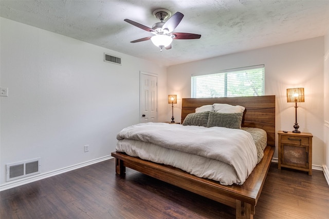 12030 Loch Ness Dr, Dallas, TX 75218 - bedroom with wood finished floors and a ceiling fan