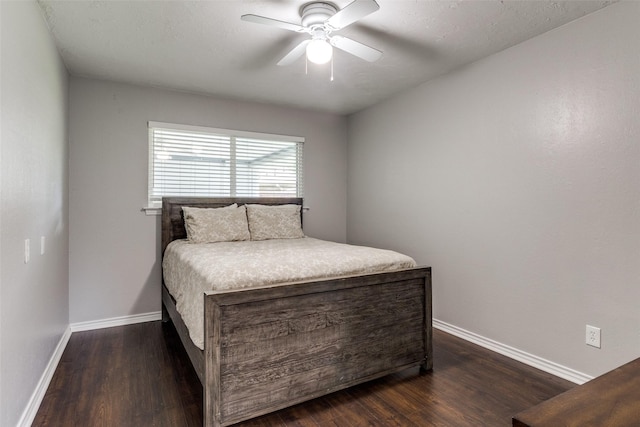 12030 Loch Ness Dr, Dallas, TX 75218 - bedroom featuring dark wood-type flooring and ceiling fan