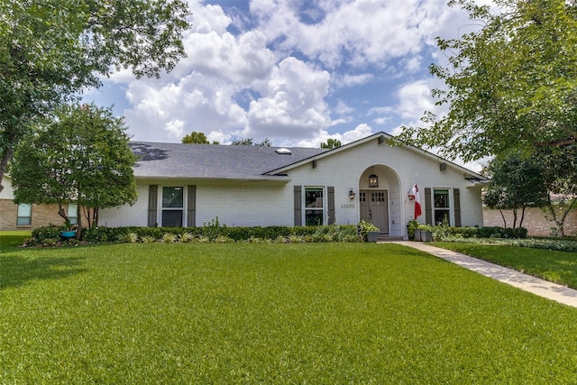 12030 Loch Ness Dr, Dallas, TX 75218 - view of front of property with brick siding, a front yard, and roof with shingles