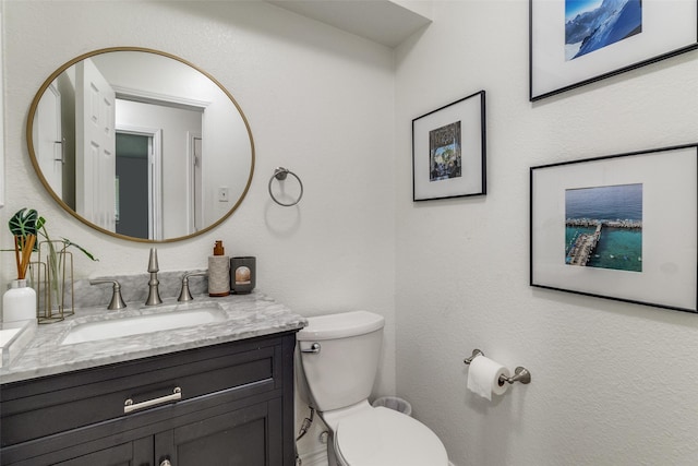 12030 Loch Ness Dr, Dallas, TX 75218 - half bath featuring vanity and toilet