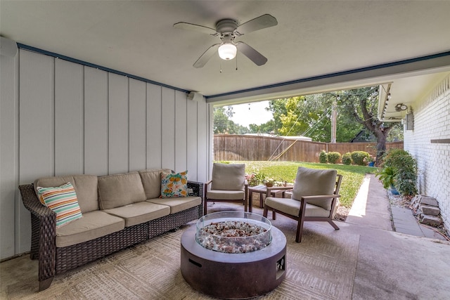 12030 Loch Ness Dr, Dallas, TX 75218 - fenced backyard featuring an outdoor living space with a fire pit, a patio area, and a ceiling fan