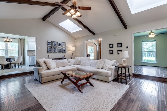 12030 Loch Ness Dr, Dallas, TX 75218 - living area with a skylight, plenty of natural light, dark wood-style flooring, and a chandelier