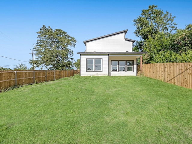1400 Belzise Ter, Fort Worth, TX 76104 - rear view of house featuring a fenced backyard