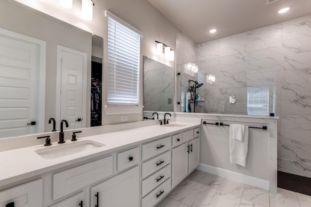 735 Red Fork Dr, Lewisville, TX 75056 - bathroom with marble finish flooring, double vanity, a marble finish shower, recessed lighting, and a spacious closet