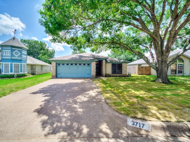 3717 Fairhaven Dr, Fort Worth, TX 76123 - ranch-style house featuring concrete driveway, an attached garage, and brick siding