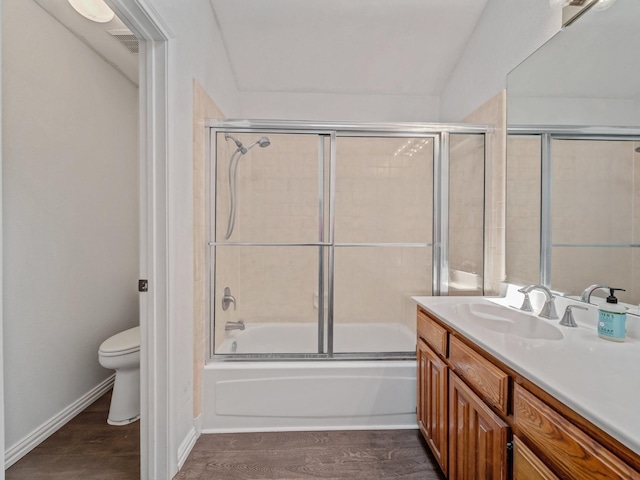 3717 Fairhaven Dr, Fort Worth, TX 76123 - full bathroom featuring vanity, combined bath / shower with glass door, and wood finished floors